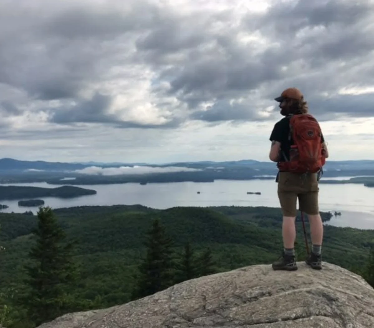 Joshua Mills taking in a view during a hike